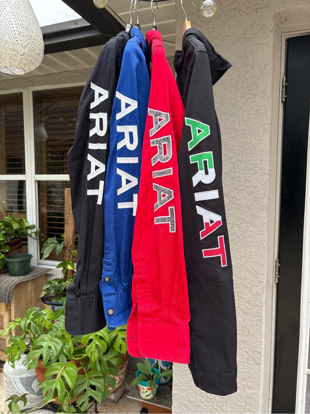 Ariat Sleeve Logo jacket in Black, white, Red & green